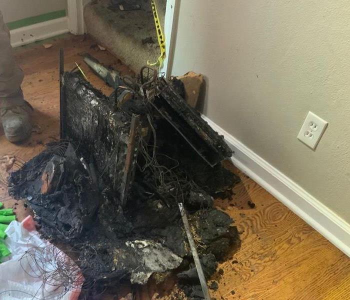 Burned air conditioning unit that started the fire